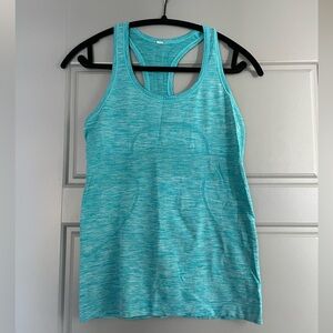 lululemon swiftly tech racerback tank top
hip length
blue
size 6